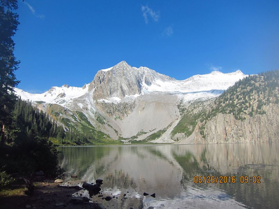 Snowmass Peak and exquisite Snowmass Lake.  Trail Rider Pass is way up to the left.