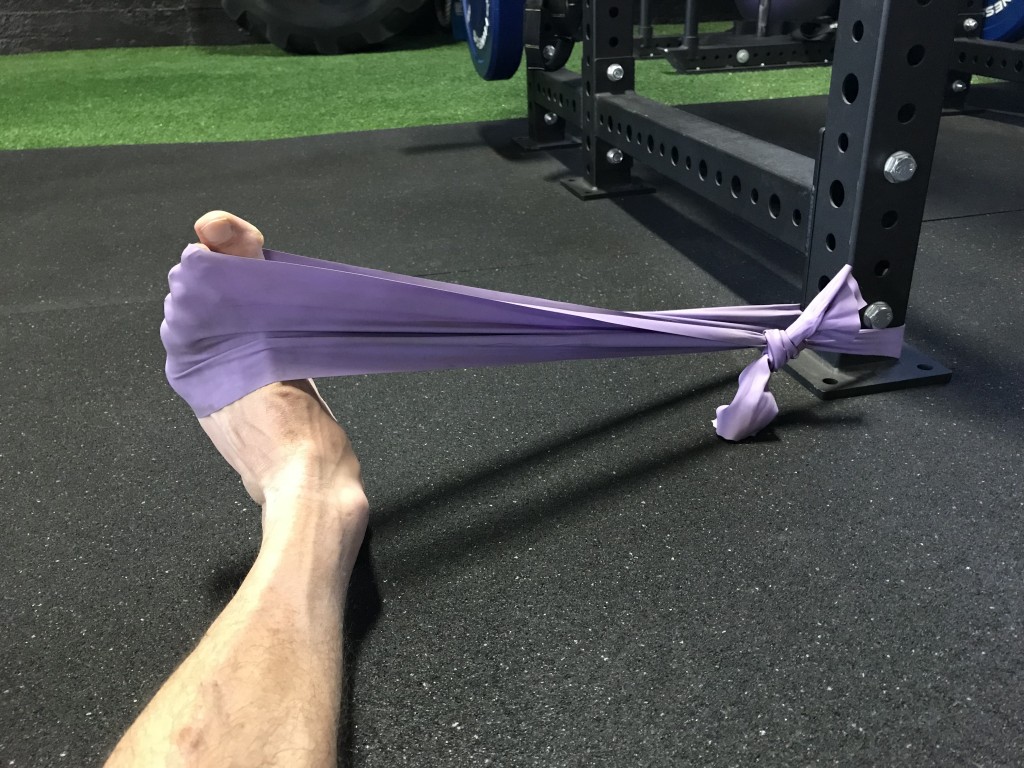 Dorsiflexion/Eversion. Think of pulling the pinky toe to the outside of the knee.